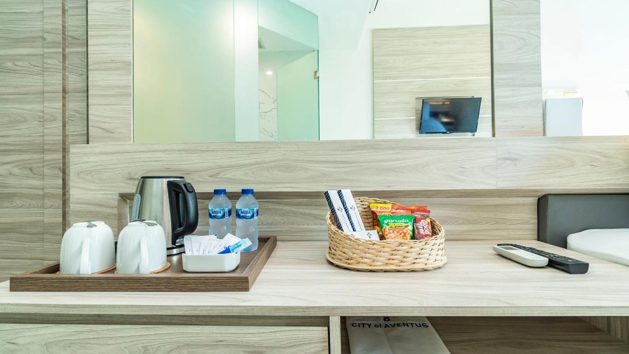 City Of Aventus Hotel - Denpasar Номер фото
